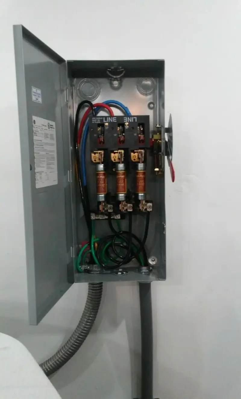 Three-phase disconnect switch installed for Smoke Detector Installation in Doral